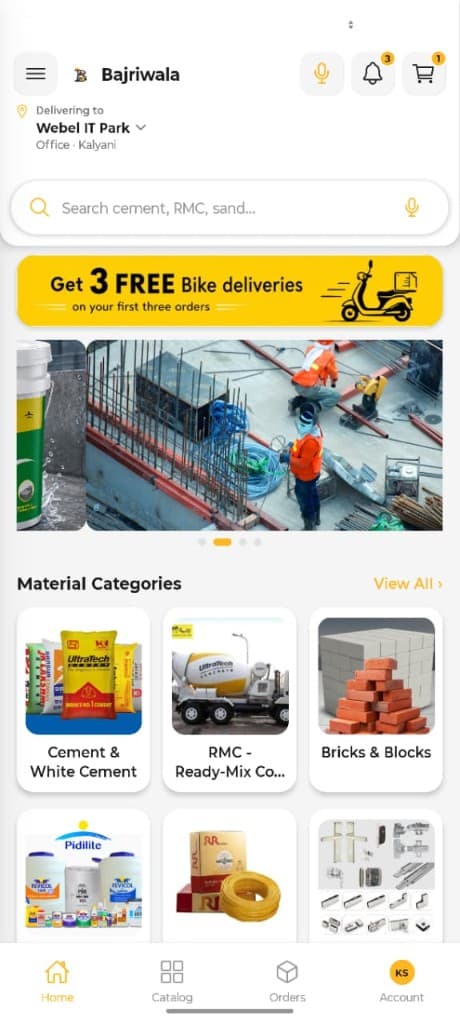 Bajriwala app home screen showing delivery location, search bar, free bike delivery banner and material categories